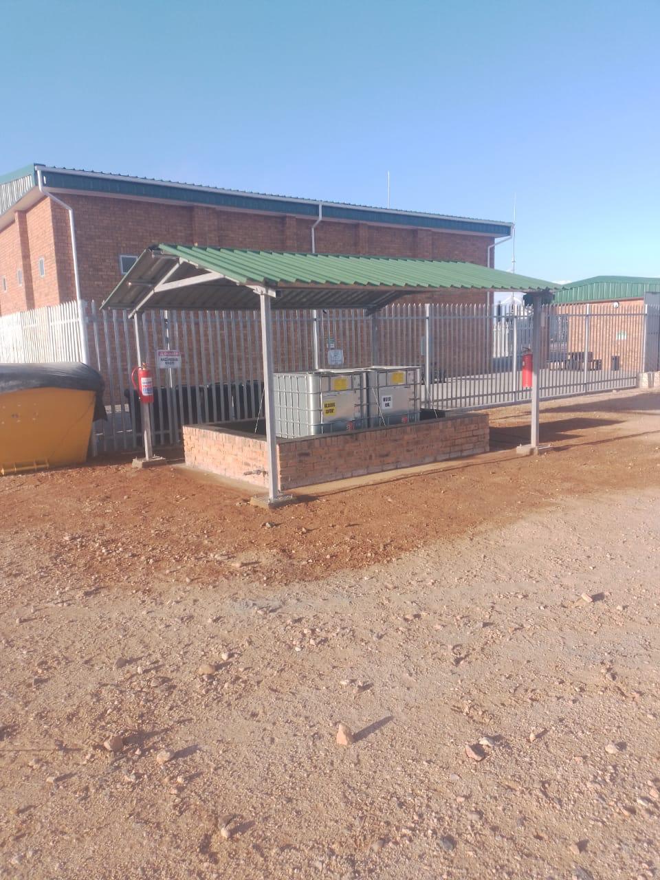 Completed bund wall containment structure at wind farm