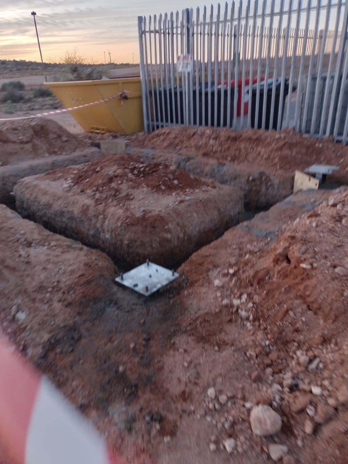 Bund wall mid-construction, wind farm — project photo